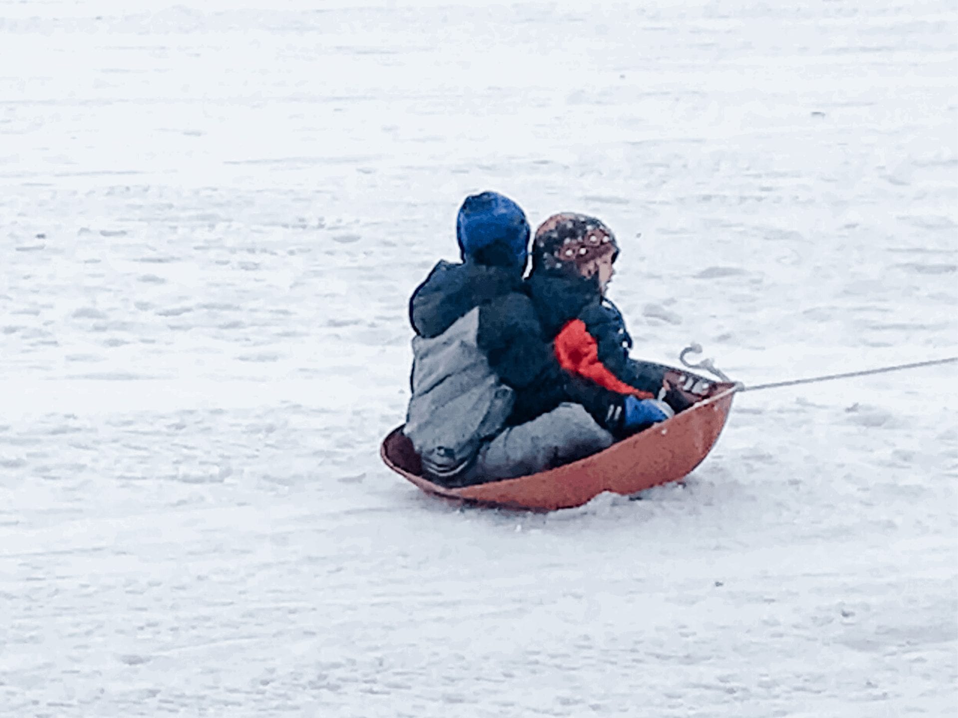 Boys sledding